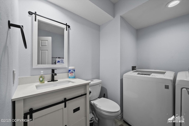 5320 Larkspur St, Anchorage, AK 99507 - bathroom with independent washer and dryer and vanity