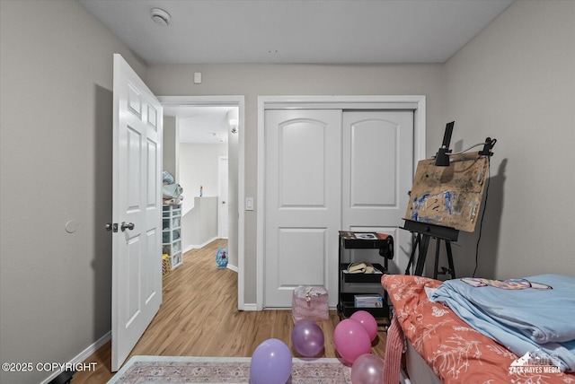 5320 Larkspur St, Anchorage, AK 99507 - bedroom with wood finished floors and a closet