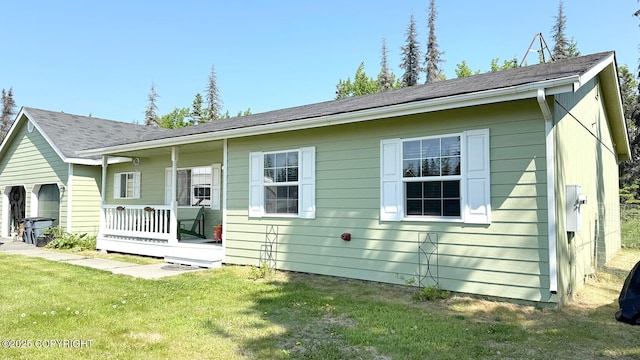 130 Amaryllis St, Soldotna, AK 99669 - view of front of house featuring a front lawn