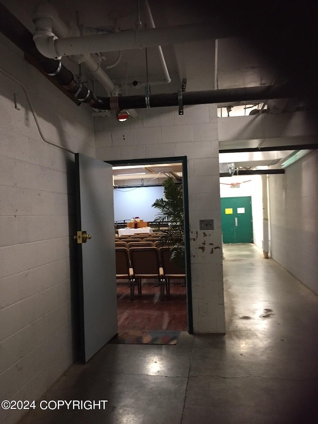 100 Kenai St # 908, Whittier, AK 99693 - hallway with finished concrete flooring and concrete block wall