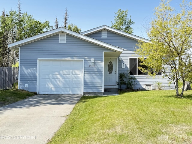 711 Maple Dr, Kenai, AK 99611 - view of front of home featuring an attached garage and driveway