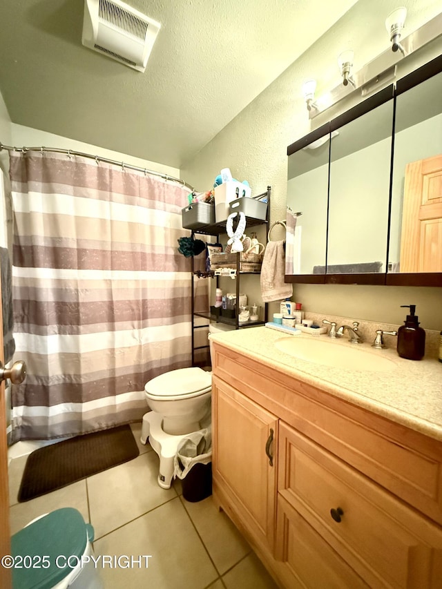 711 Maple Dr, Kenai, AK 99611 - bathroom with vanity, tile patterned flooring, and a shower with shower curtain