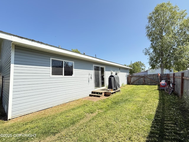 711 Maple Dr, Kenai, AK 99611 - rear view of property featuring a fenced backyard