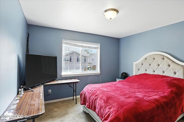 6403 E 10th Ave # 26, Anchorage, AK 99504 - bedroom featuring carpet floors and baseboards