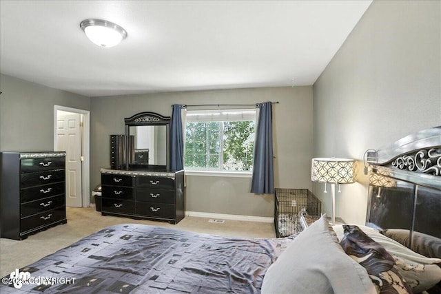 6403 E 10th Ave # 26, Anchorage, AK 99504 - bedroom featuring light carpet