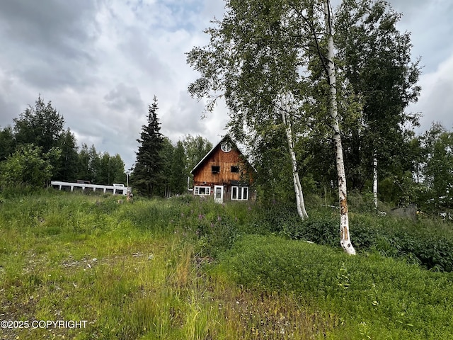 21113 W Matsnu Rd, Big Lake, AK 99623 - view of yard featuring a barn and an outbuilding