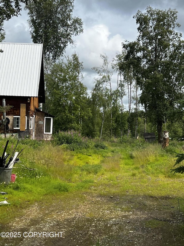 21113 W Matsnu Rd, Big Lake, AK 99623 - view of yard with a barn and an outbuilding