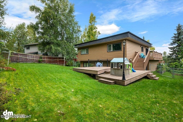 6340 Habicht Ct, Anchorage, AK 99504 - back of house featuring a fenced backyard, a wooden deck, and stairs