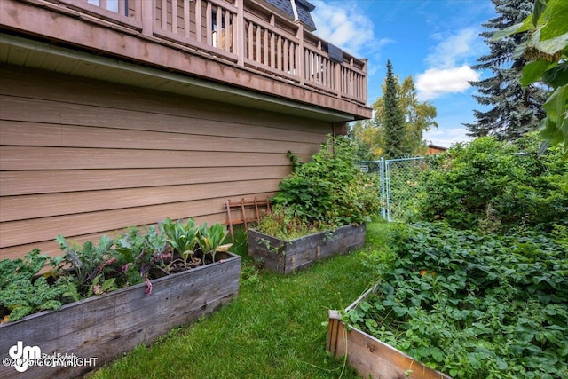 6340 Habicht Ct, Anchorage, AK 99504 - view of home's exterior featuring a garden