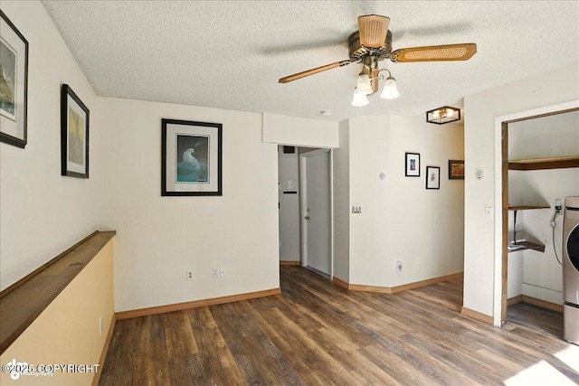 6340 Habicht Ct, Anchorage, AK 99504 - unfurnished room with wood finished floors, a textured ceiling, and a ceiling fan