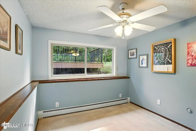 6340 Habicht Ct, Anchorage, AK 99504 - empty room featuring a baseboard radiator, a textured ceiling, a ceiling fan, and carpet flooring