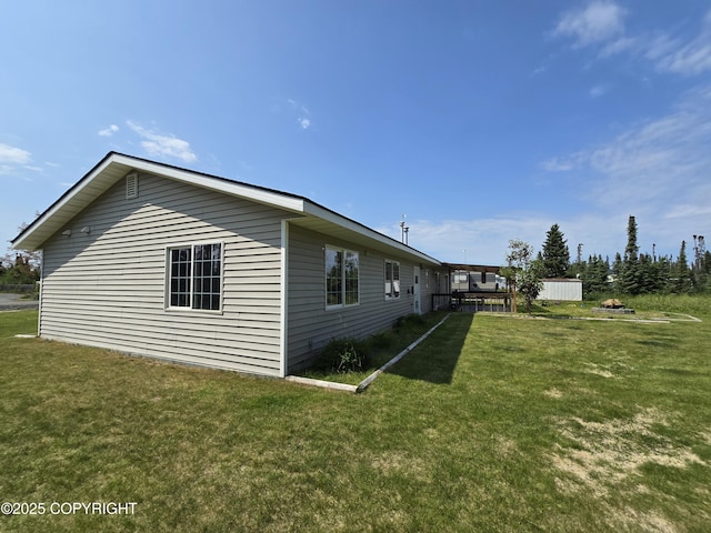 46270 Woodwill Dr, Kenai, AK 99611 - view of home's exterior featuring a yard
