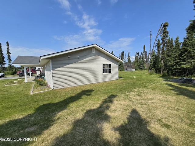 46270 Woodwill Dr, Kenai, AK 99611 - view of side of home featuring a yard