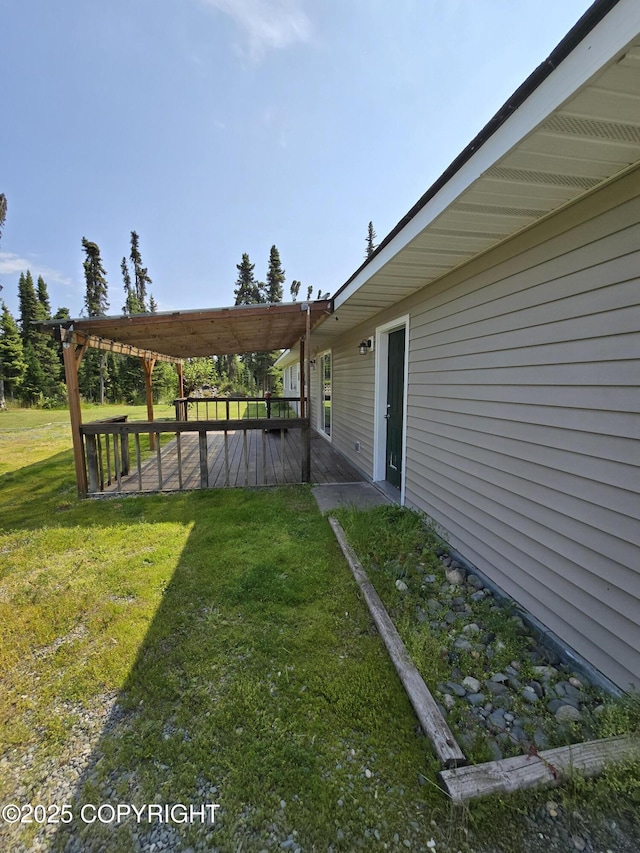 46270 Woodwill Dr, Kenai, AK 99611 - view of grassy yard featuring a wooden deck