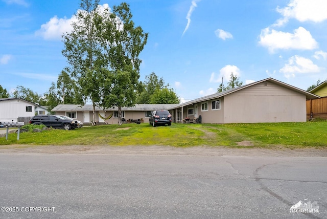 4116 W 88th Ave, Anchorage, AK 99502 - ranch-style house with a front lawn