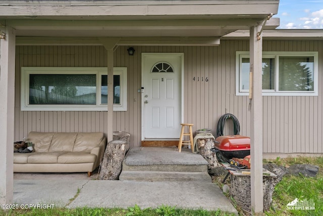 4116 W 88th Ave, Anchorage, AK 99502 - view of exterior entry featuring a porch