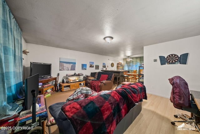 4116 W 88th Ave, Anchorage, AK 99502 - living area featuring wood finished floors and a textured ceiling
