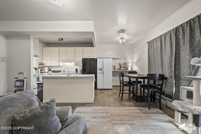 4116 W 88th Ave, Anchorage, AK 99502 - living room with concrete floors