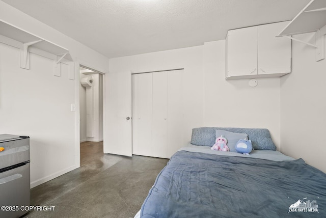 4116 W 88th Ave, Anchorage, AK 99502 - bedroom with finished concrete floors, a closet, and fridge