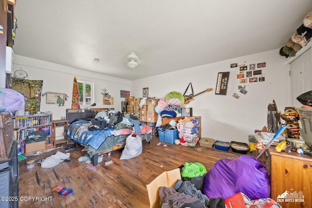 4116 W 88th Ave, Anchorage, AK 99502 - bedroom featuring wood finished floors