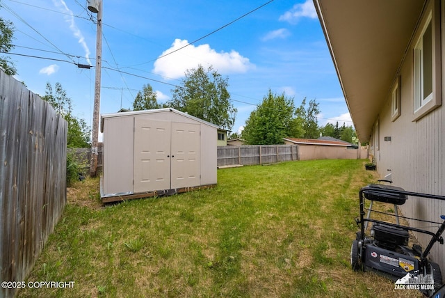 4116 W 88th Ave, Anchorage, AK 99502 - fenced backyard with a shed