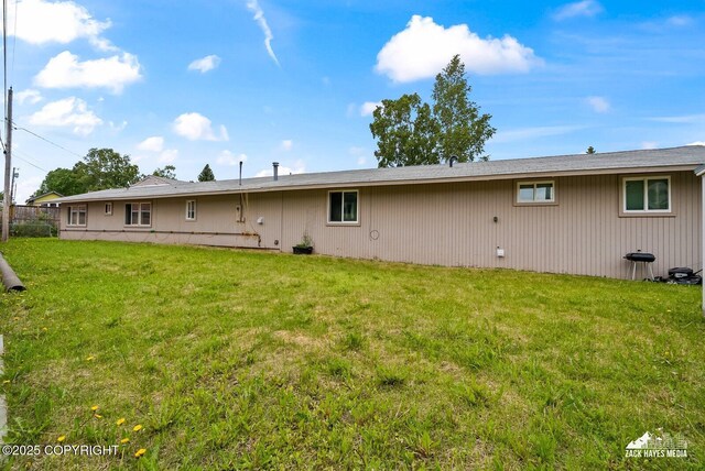 4116 W 88th Ave, Anchorage, AK 99502 - back of property with a lawn