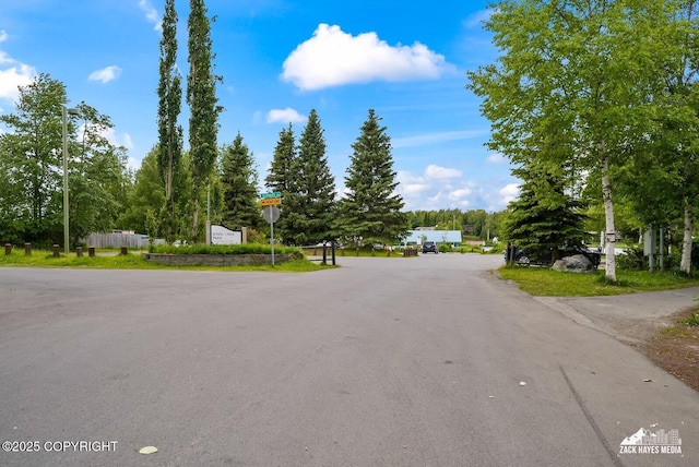 4116 W 88th Ave, Anchorage, AK 99502 - view of asphalt street with traffic signs