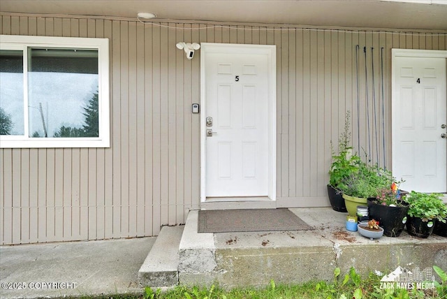 4116 W 88th Ave, Anchorage, AK 99502 - entrance to property with a surveillance system