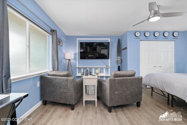 4116 W 88th Ave, Anchorage, AK 99502 - bedroom with light wood-style floors, a closet, and ceiling fan