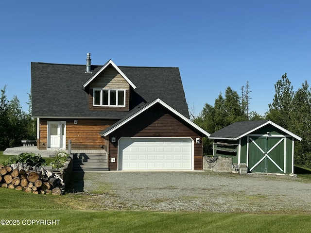 10821 E Valley Crest Dr, Palmer, AK 99645 - view of front facade featuring a garage and driveway