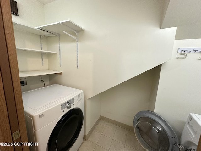 10821 E Valley Crest Dr, Palmer, AK 99645 - washroom featuring independent washer and dryer and light tile patterned floors