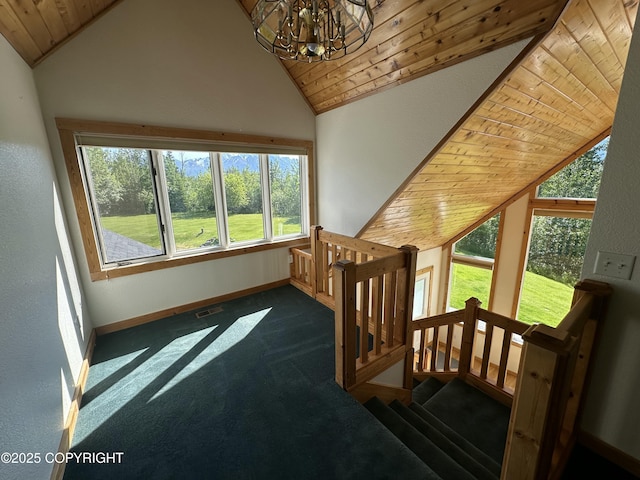 10821 E Valley Crest Dr, Palmer, AK 99645 - additional living space with vaulted ceiling, wooden ceiling, a chandelier, carpet flooring, and plenty of natural light
