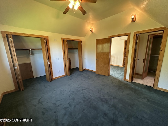 10821 E Valley Crest Dr, Palmer, AK 99645 - unfurnished bedroom with two closets, vaulted ceiling, carpet, and a ceiling fan