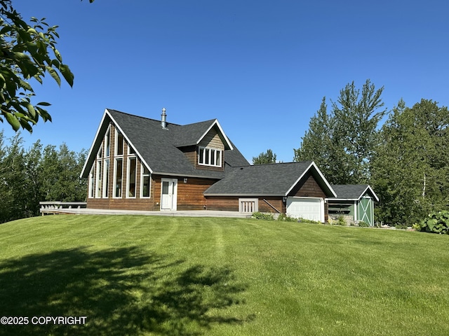 10821 E Valley Crest Dr, Palmer, AK 99645 - view of front of home with a front yard and a shingled roof