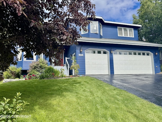 13404 Mainsail Dr, Anchorage, AK 99516 - view of front of property with a garage, a front lawn, and asphalt driveway