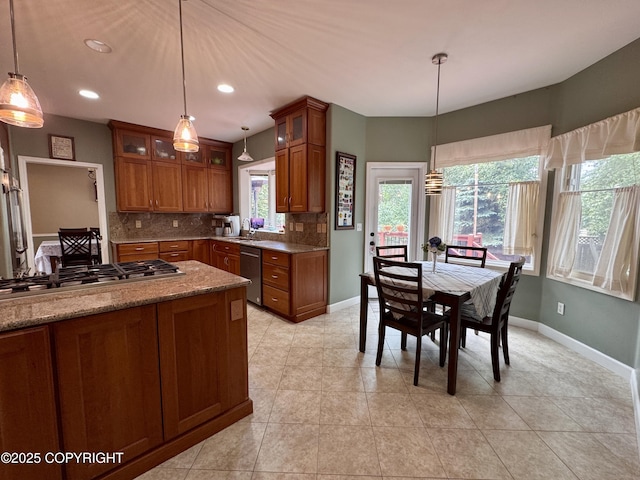 13404 Mainsail Dr, Anchorage, AK 99516 - kitchen featuring brown cabinets, stainless steel appliances, tasteful backsplash, pendant lighting, and recessed lighting