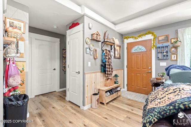 5050 N Gold Mint Dr, Wasilla, AK 99654 - entryway with light wood-style floors and wainscoting