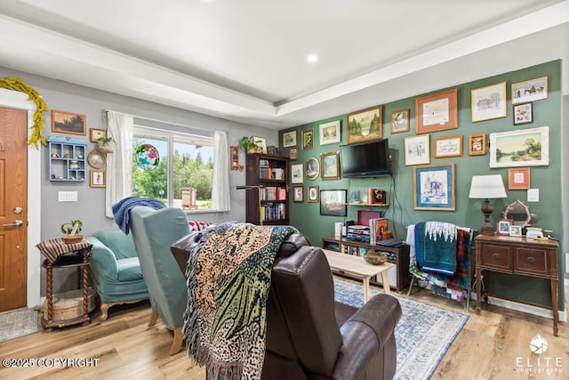 5050 N Gold Mint Dr, Wasilla, AK 99654 - living area with wood finished floors, recessed lighting, and a raised ceiling