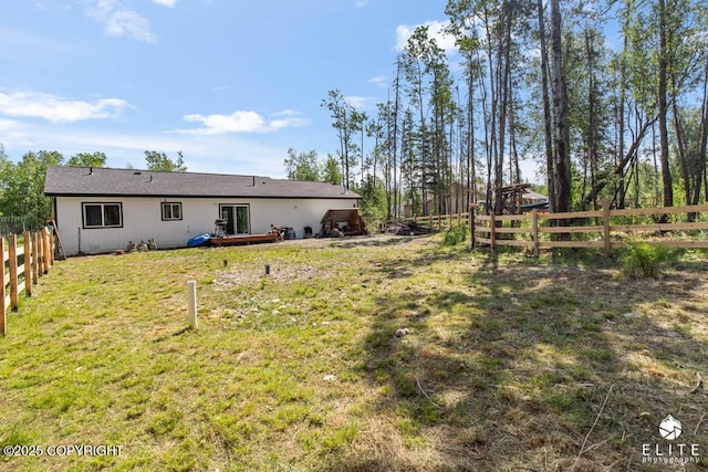 5050 N Gold Mint Dr, Wasilla, AK 99654 - rear view of house featuring a fenced backyard