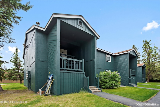 10201 Jamestown Dr # A102, Anchorage, AK 99507 - mid-century home with a front lawn