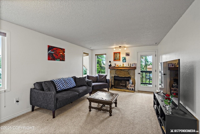10201 Jamestown Dr # A102, Anchorage, AK 99507 - living area featuring light carpet, a textured ceiling, and a fireplace