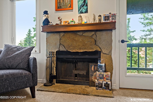 10201 Jamestown Dr # A102, Anchorage, AK 99507 - detailed view of a stone fireplace and carpet floors