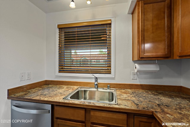 10201 Jamestown Dr # A102, Anchorage, AK 99507 - kitchen with dishwasher, brown cabinets, and dark countertops