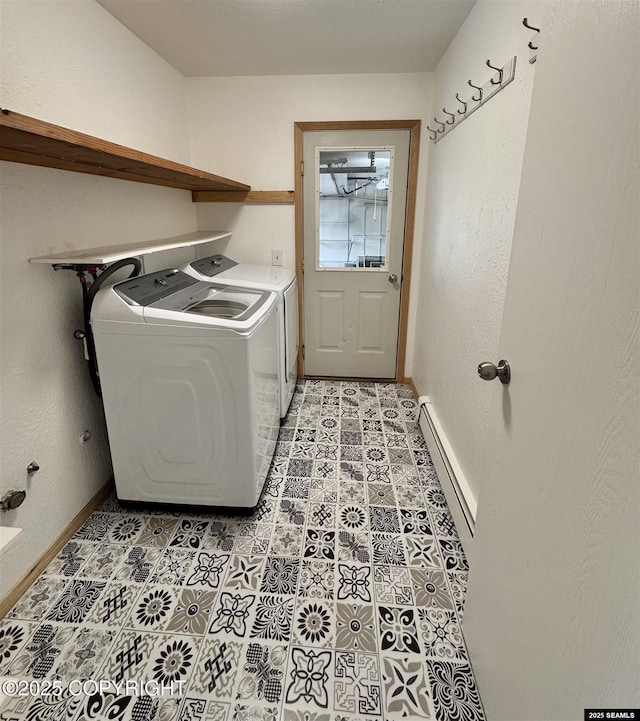 5920 Lund St, Juneau, AK 99801 - laundry area with a baseboard heating unit, washer and dryer, and light tile patterned floors