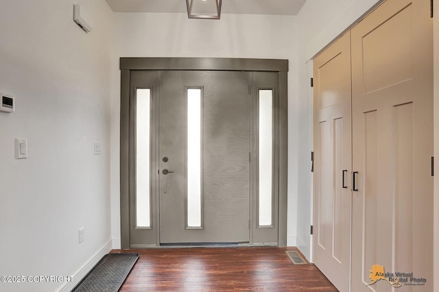 4576 S Gon Fishin Dr, Wasilla, AK 99623 - entrance foyer featuring dark wood-type flooring and baseboards