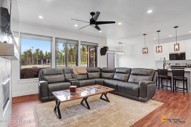 4576 S Gon Fishin Dr, Wasilla, AK 99623 - living area with dark wood-style flooring, recessed lighting, and a ceiling fan