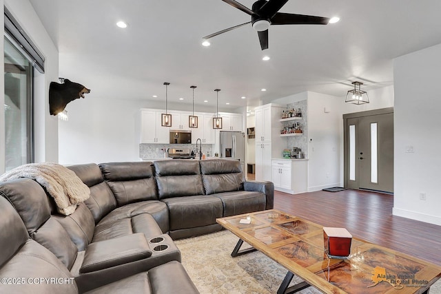 4576 S Gon Fishin Dr, Wasilla, AK 99623 - living area with a ceiling fan, wood finished floors, and recessed lighting