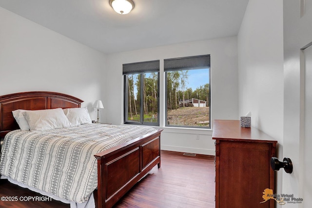 4576 S Gon Fishin Dr, Wasilla, AK 99623 - bedroom featuring dark wood finished floors and baseboards