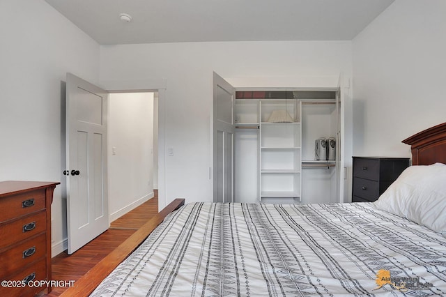4576 S Gon Fishin Dr, Wasilla, AK 99623 - bedroom featuring wood finished floors and a closet