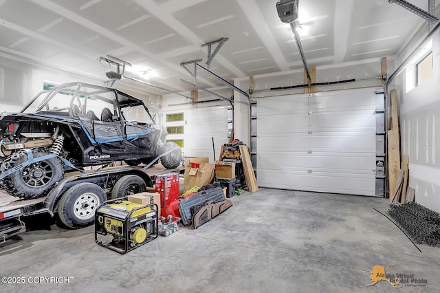 4576 S Gon Fishin Dr, Wasilla, AK 99623 - garage featuring a garage door opener